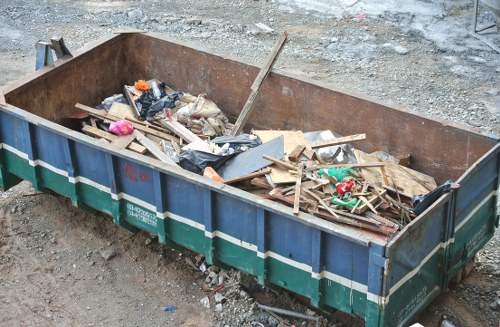 Demolition site with debris ready for removal in Hornsey