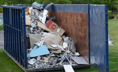Professional muck away team clearing waste in Hornsey